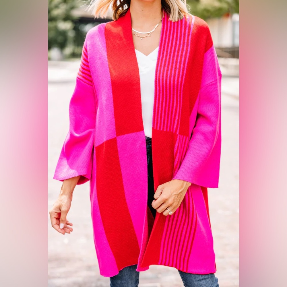 Dressed in LALA absolutely adorable pink and red open Cardi!! It’s perfect! ❤️🩷